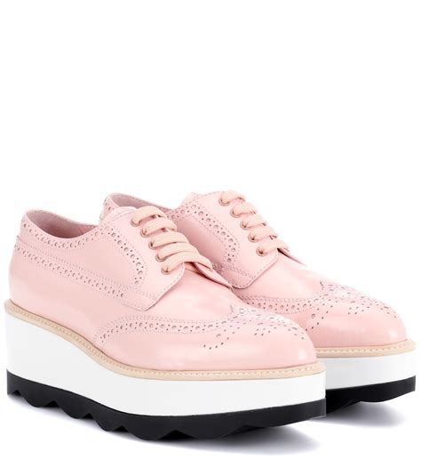 prada pink platform sneakers.